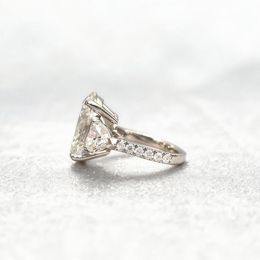 Oval-Center Trilogy Ring with Pear Sidestones
