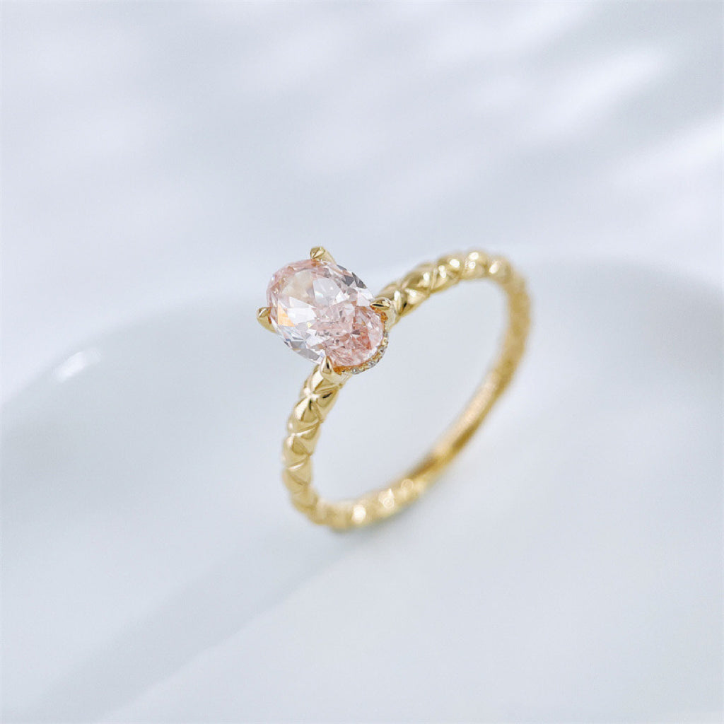Oval Cut Lab Grown Pink Diamond Braided Band Solitaire Ring | 18K Gold