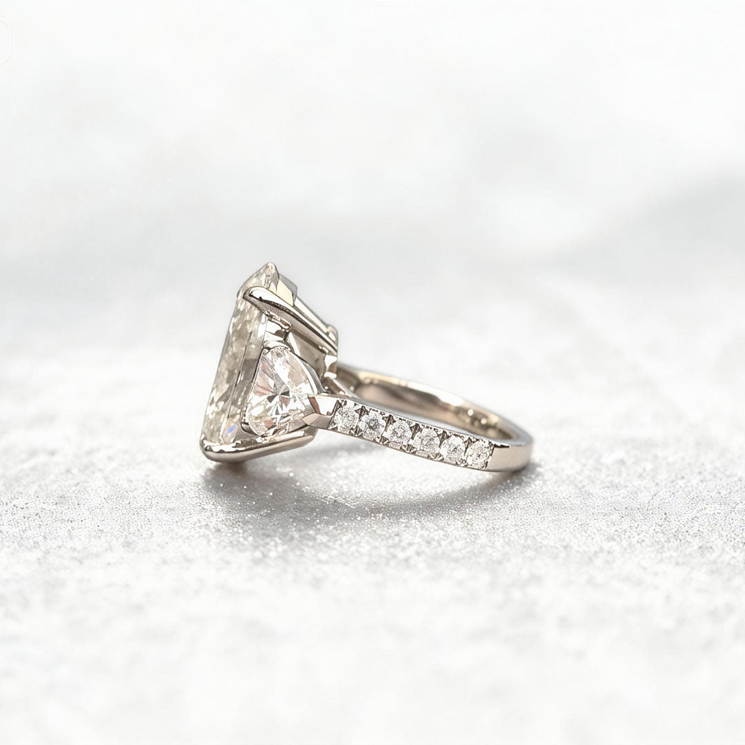 Oval-Center Trilogy Ring with Pear Sidestones