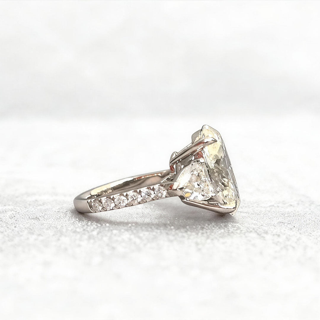 Oval-Center Trilogy Ring with Pear Sidestones