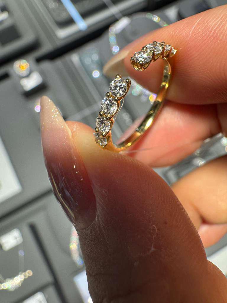 a link for Ashlee to pay for one band and one diamond ring
