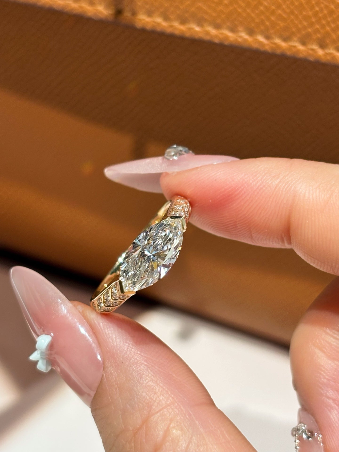 18K Gold Marquise Cut Diamond Solitaire with Pavé Accents