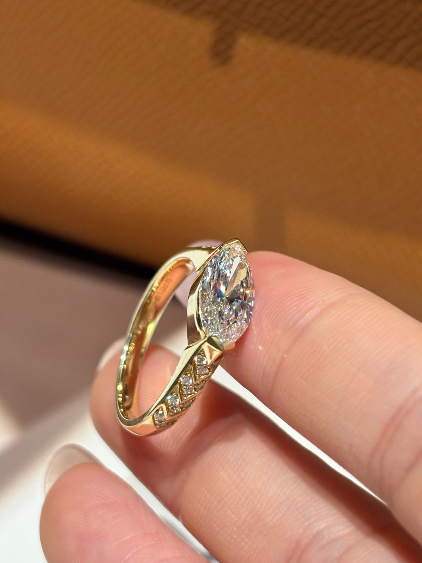 18K Gold Marquise Cut Diamond Solitaire with Pavé Accents