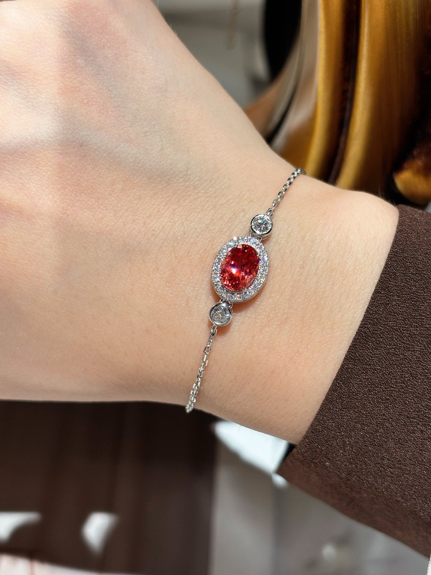 1.77ct 3.96g Oval Lab Padparadscha Sapphire Bracelet with Diamond Halo & Bezel Round Diamonds | Platinum
