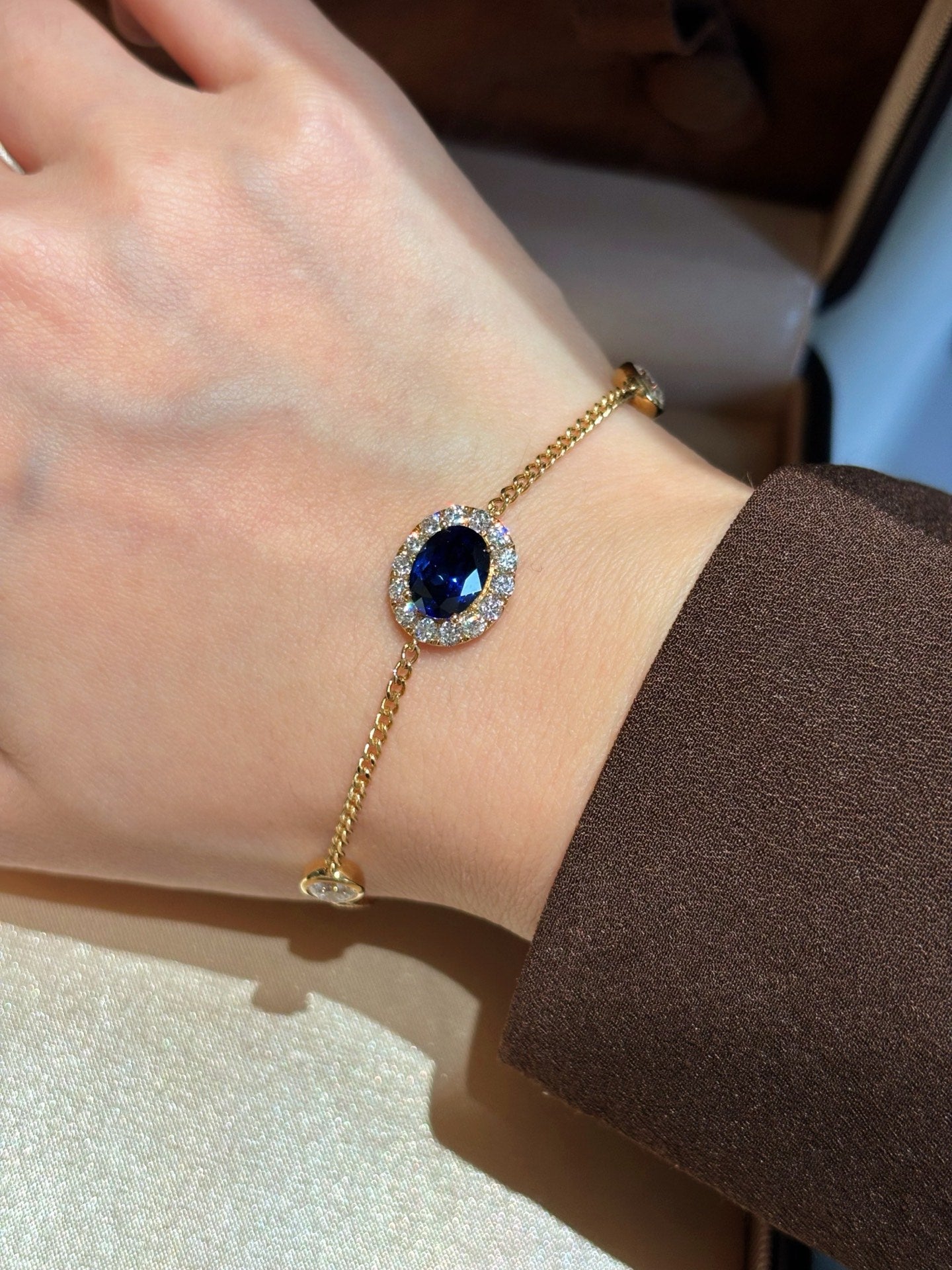 Oval Lab Royal Blue Sapphire Bracelet with Diamond Halo & Bezel Round Accents | 18K Yellow Gold