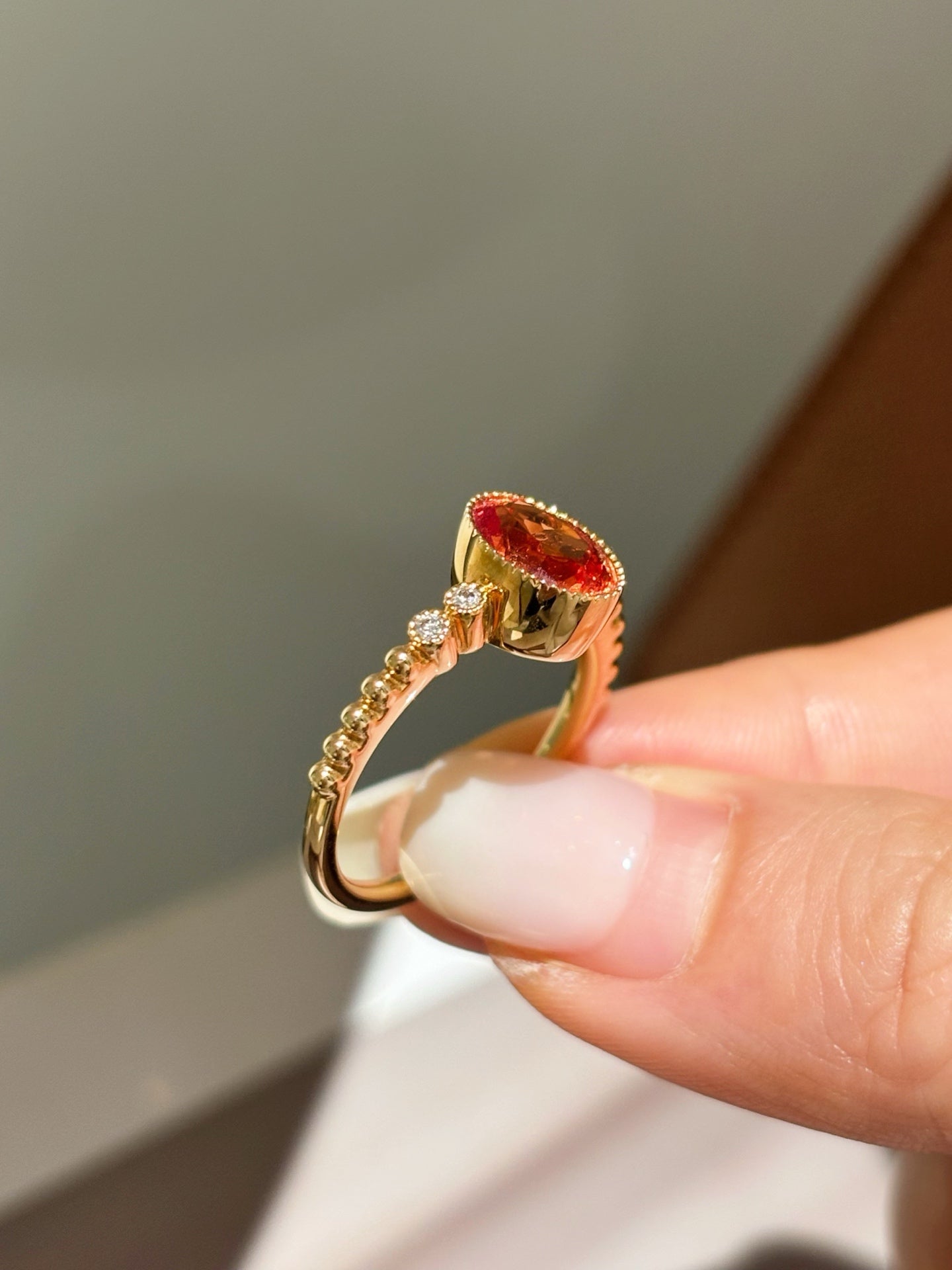 Bezel-Set Oval Orange Lab-Grown Gemstone with Diamond Accent Solitaire Ring | 18K Gold
