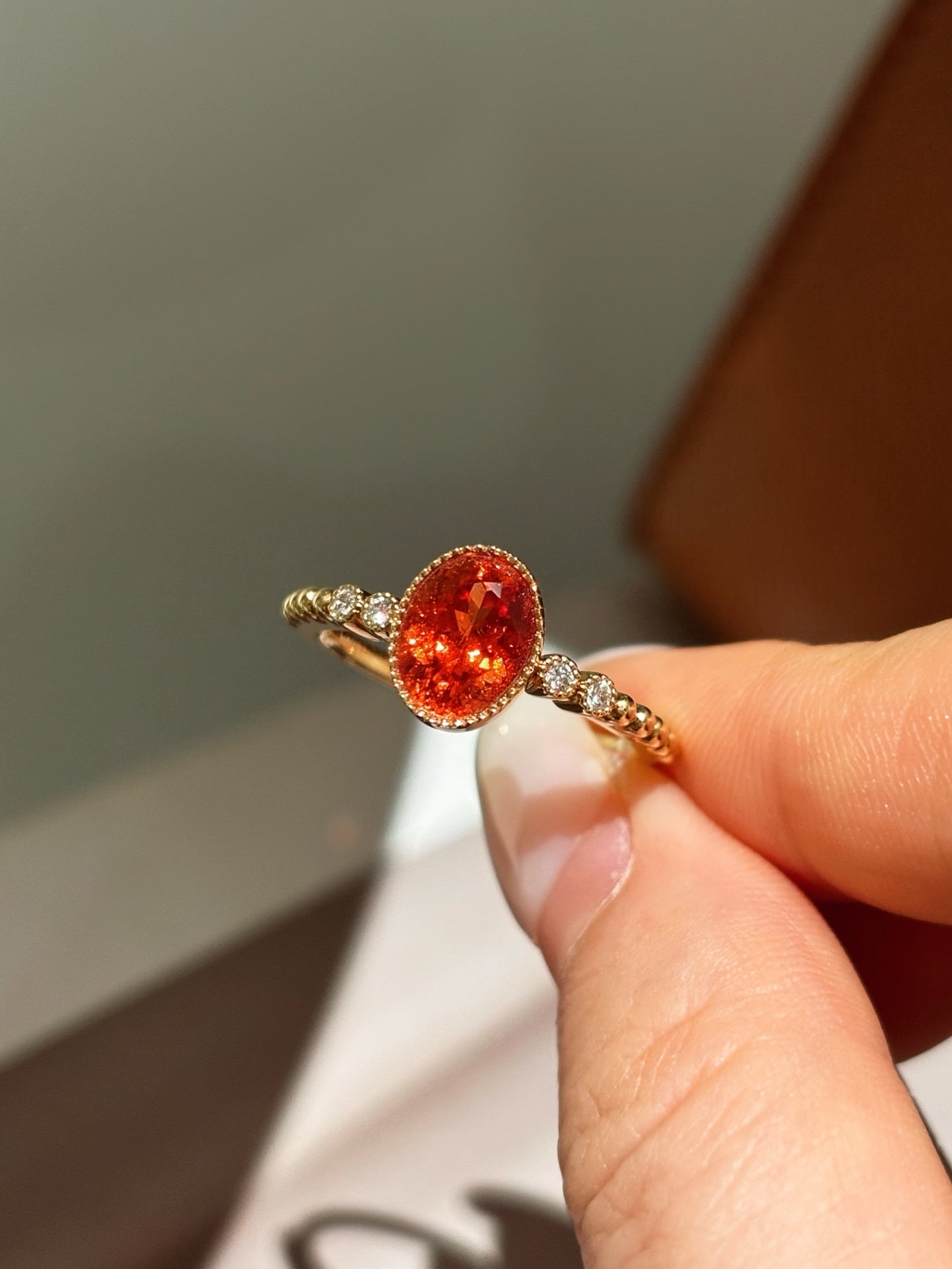 Bezel-Set Oval Orange Lab-Grown Gemstone with Diamond Accent Solitaire Ring | 18K Gold