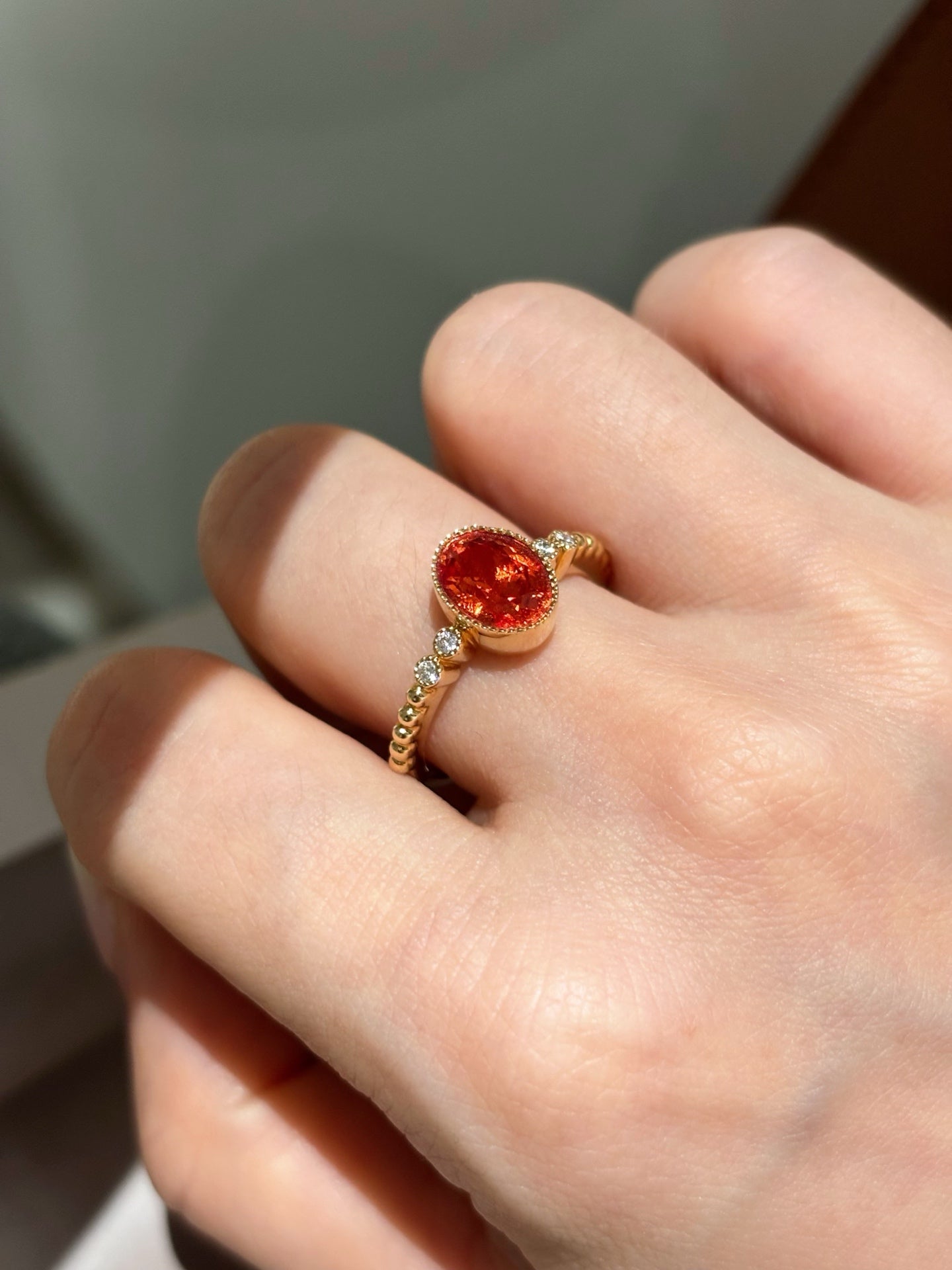 Bezel-Set Oval Orange Lab-Grown Gemstone with Diamond Accent Solitaire Ring | 18K Gold