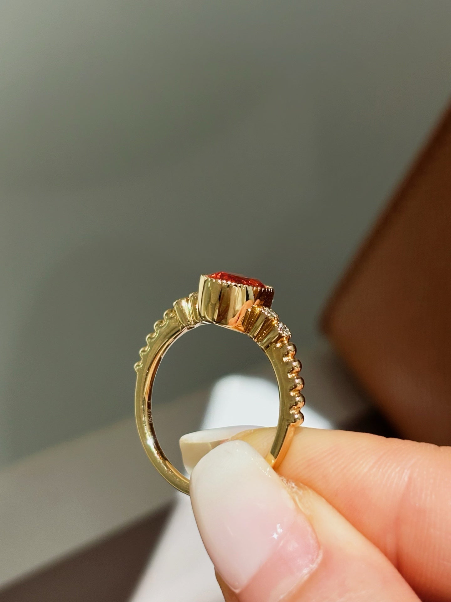 Bezel-Set Oval Orange Lab-Grown Gemstone with Diamond Accent Solitaire Ring | 18K Gold