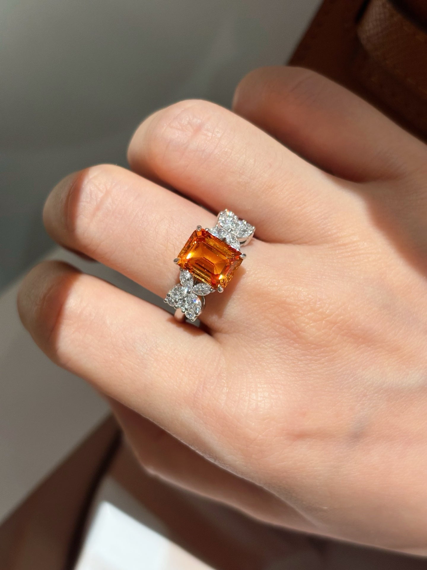 Emerald-Cut Orange Lab-Grown Gemstone with Marquise & Round Diamond Accent Three-Stone Engagement Ring | Platinum