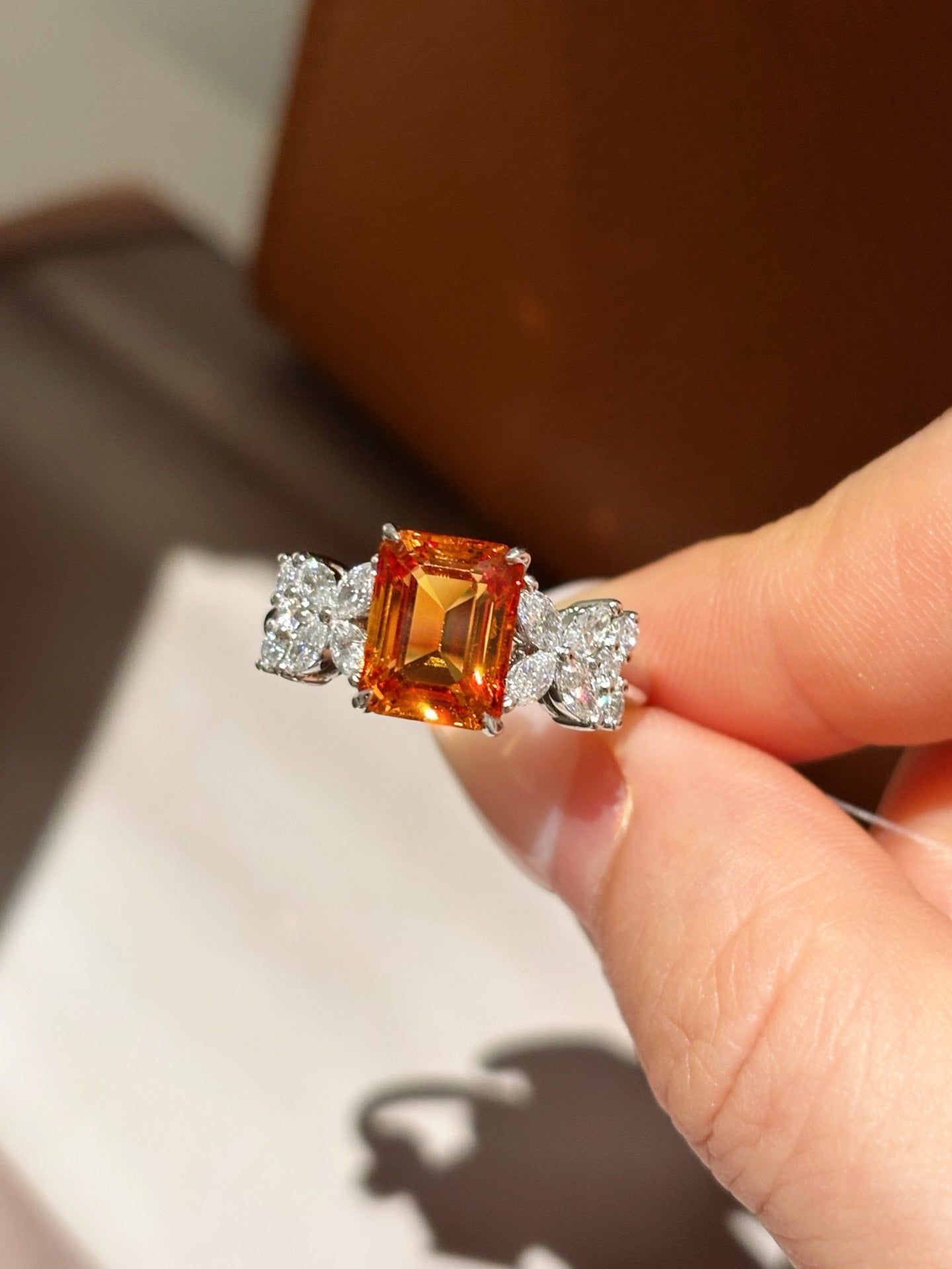 Emerald-Cut Orange Lab-Grown Gemstone with Marquise & Round Diamond Accent Three-Stone Engagement Ring | Platinum