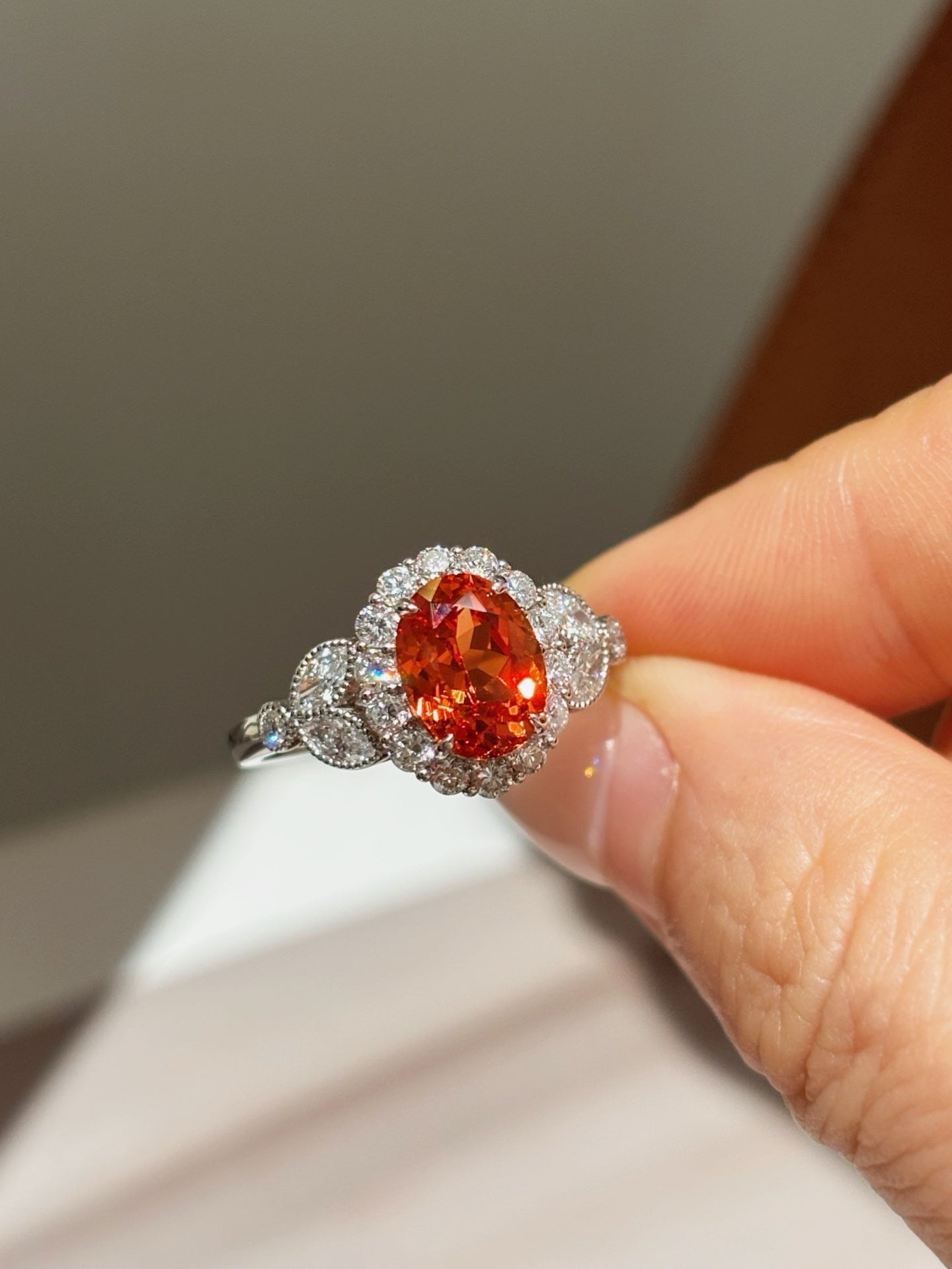 Oval Orange Lab-Grown Gemstone with Diamond Halo & Side Accent Engagement Ring | 18K Gold