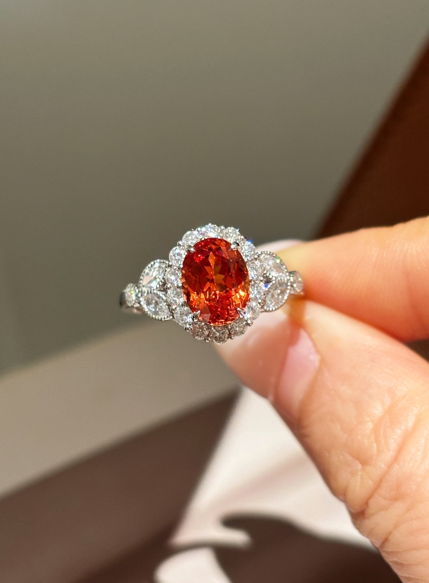 Oval Orange Lab-Grown Gemstone with Diamond Halo & Side Accent Engagement Ring | 18K Gold