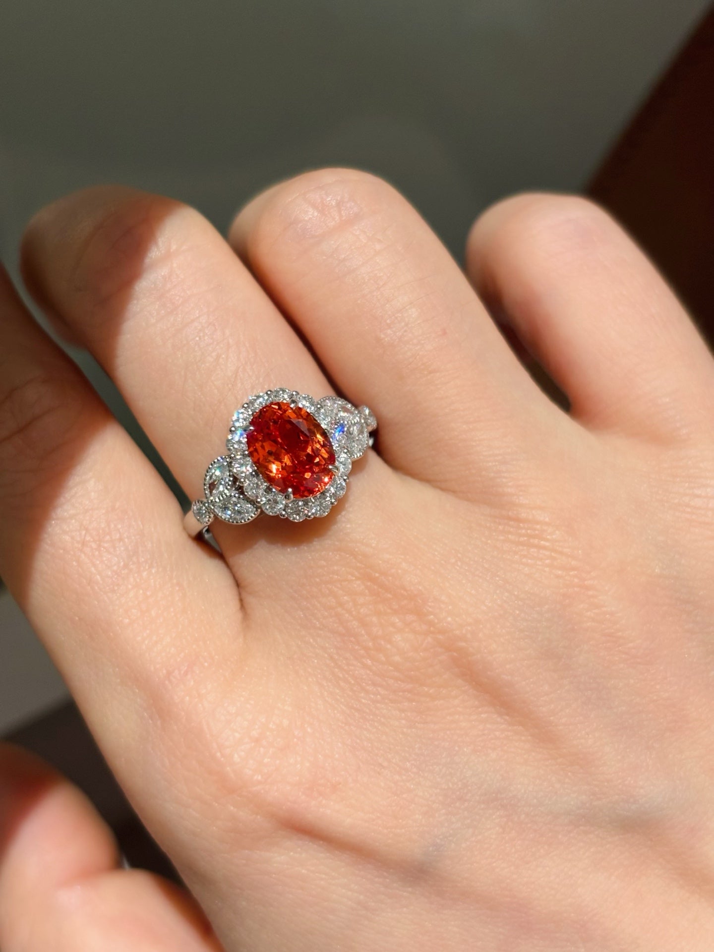 Oval Orange Lab-Grown Gemstone with Diamond Halo & Side Accent Engagement Ring | 18K Gold