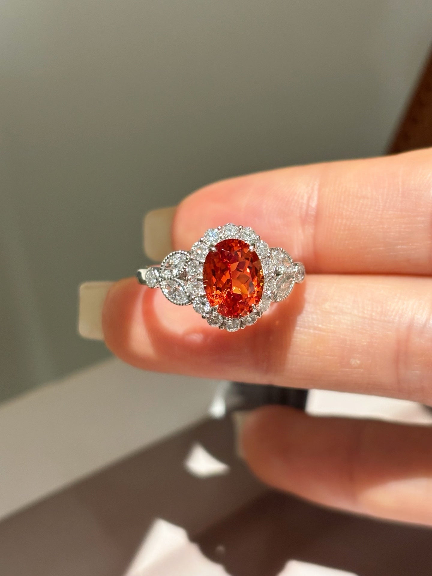 Oval Orange Lab-Grown Gemstone with Diamond Halo & Side Accent Engagement Ring | 18K Gold