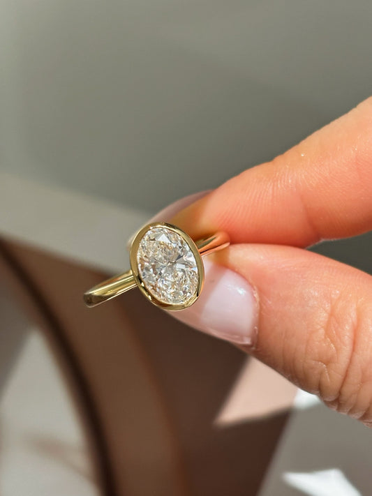 Oval Cut Lab Grown Diamond Solitaire Ring | Bezel-Set in Solid 18K Yellow Gold
