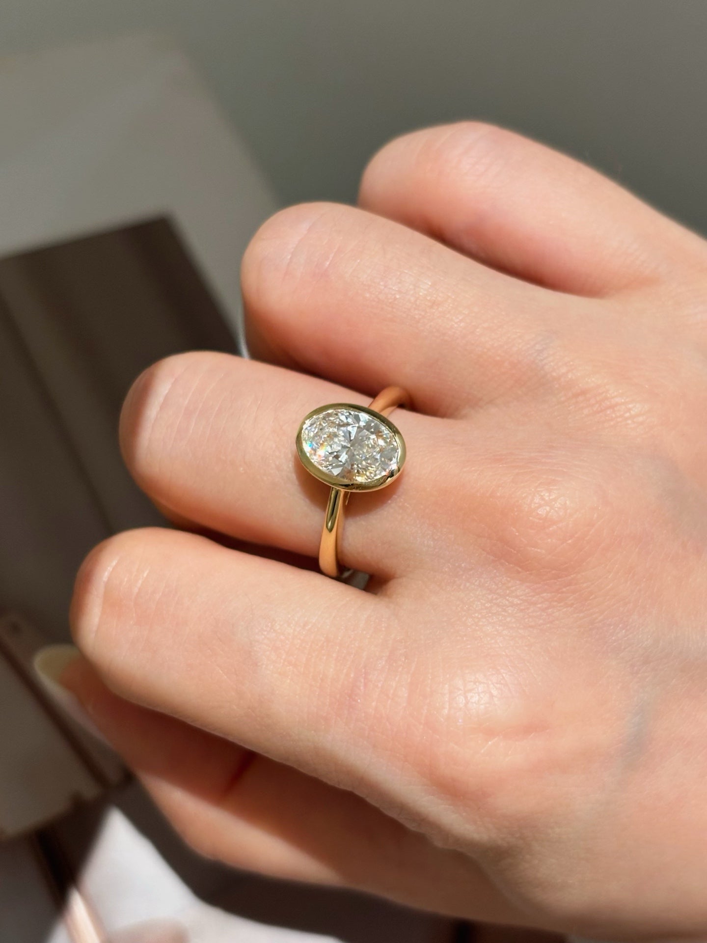 Oval Cut Lab Grown Diamond Solitaire Ring | Bezel-Set in Solid 18K Yellow Gold