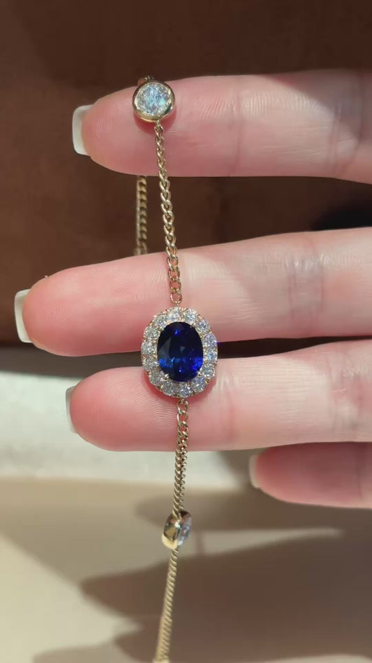 Oval Lab Royal Blue Sapphire Bracelet with Diamond Halo & Bezel Round Accents | 18K Yellow Gold
